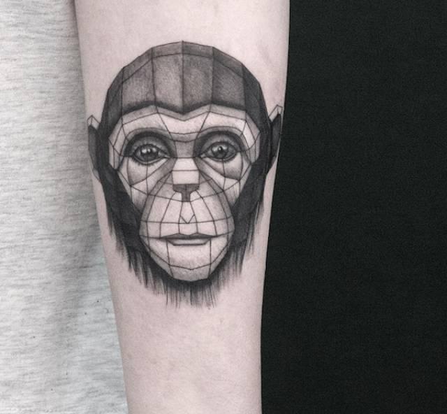 tattoo, Monkey Monkey in black and grey with a bit of geometric flavour to it