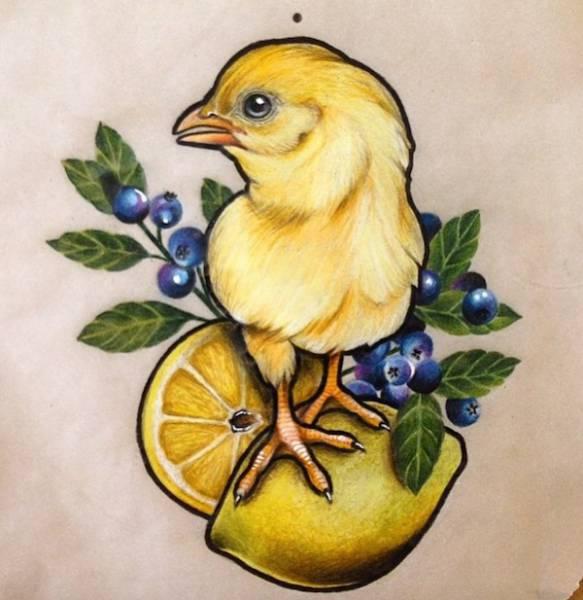 tattoo, Lemon Chicken A tiny chicken on a lemon with blue berries around it.
Who comes up with such ideas? :D